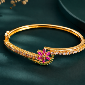 Gold Plated Bracelet with Floral Center and Red Green Stones