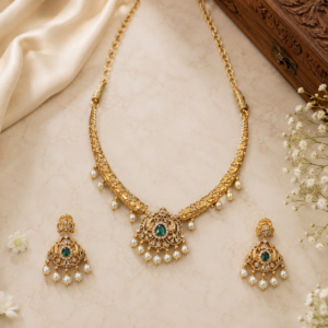 Gold Finish Traditional Necklace Set with Green Stone and Pearl Drops