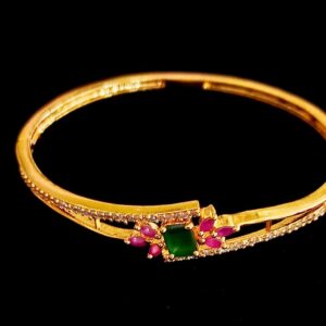 Gold Plated Bracelet with Green Center Stone and Red Stones