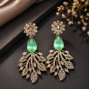 Designer Crystal Jhumka Earrings with Green Stone Drop